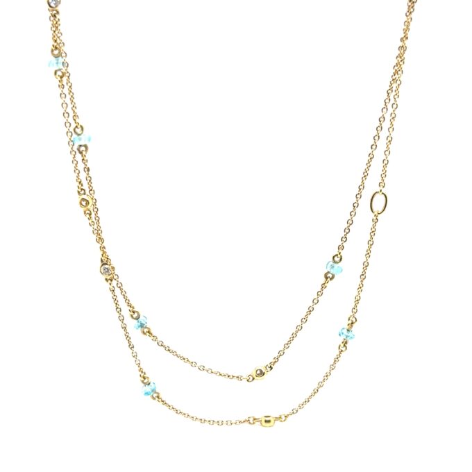 18ct yellow gold trace link necklace with blue apatite and dezel set round brilliant diamonds, 54cm long, diamond weight